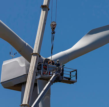 Wind turbine being repaired, for power generation